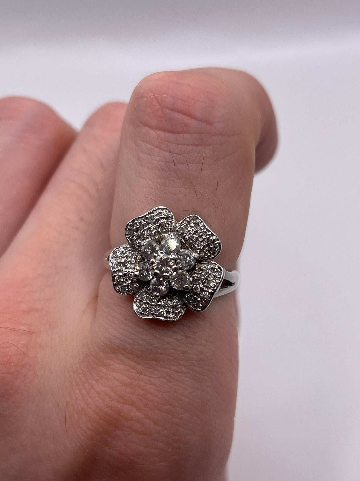 Heavy 18ct white gold diamond cluster ring