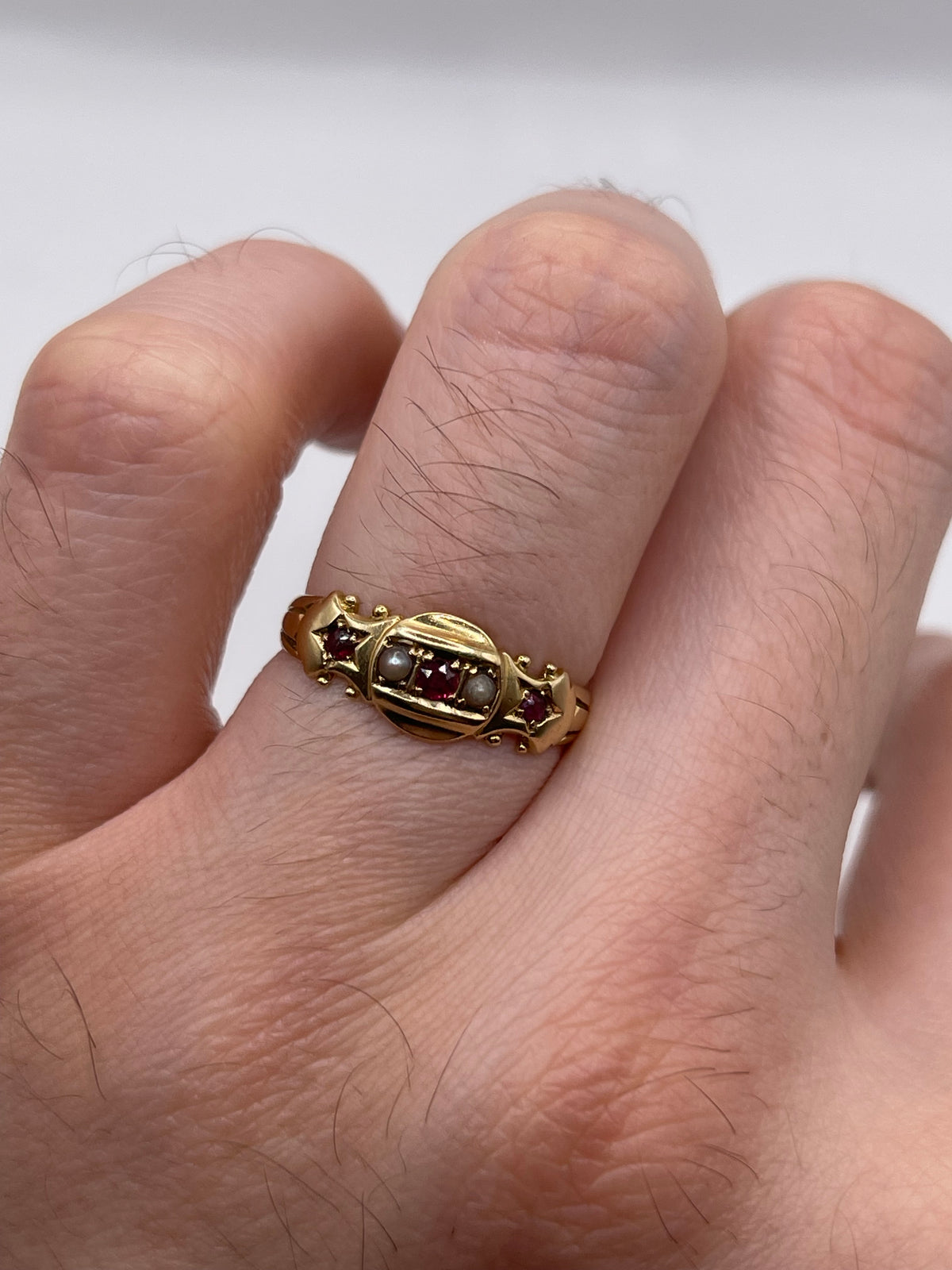 Antique 18ct gold ruby and pearl ring
