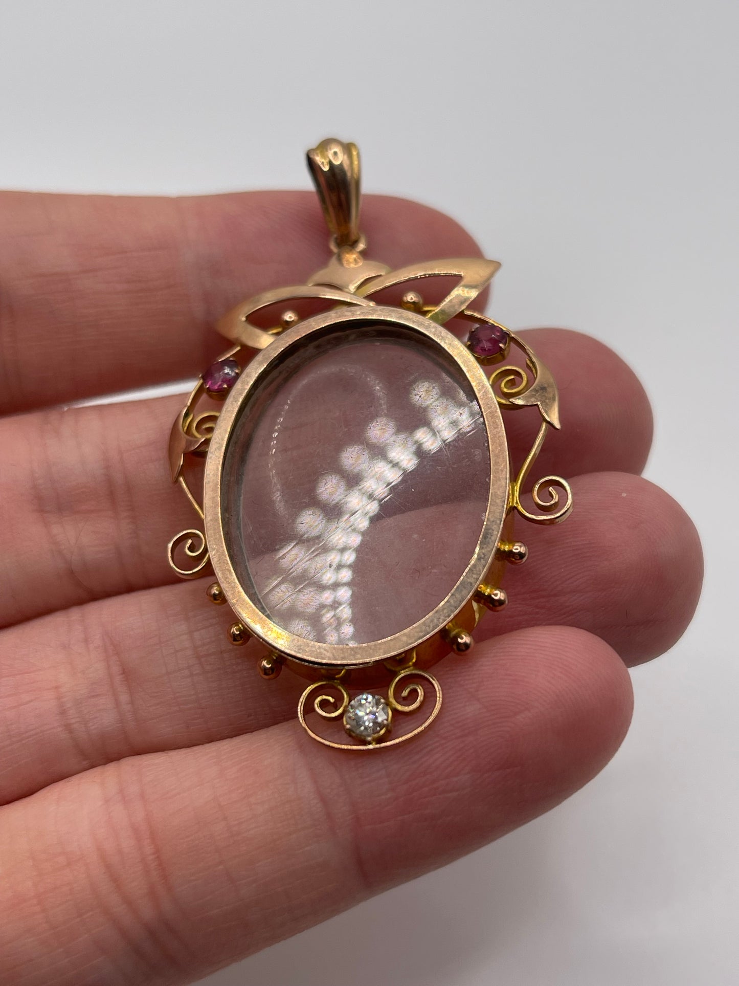 Antique 9ct rose gold garnet and diamond locket / pendant