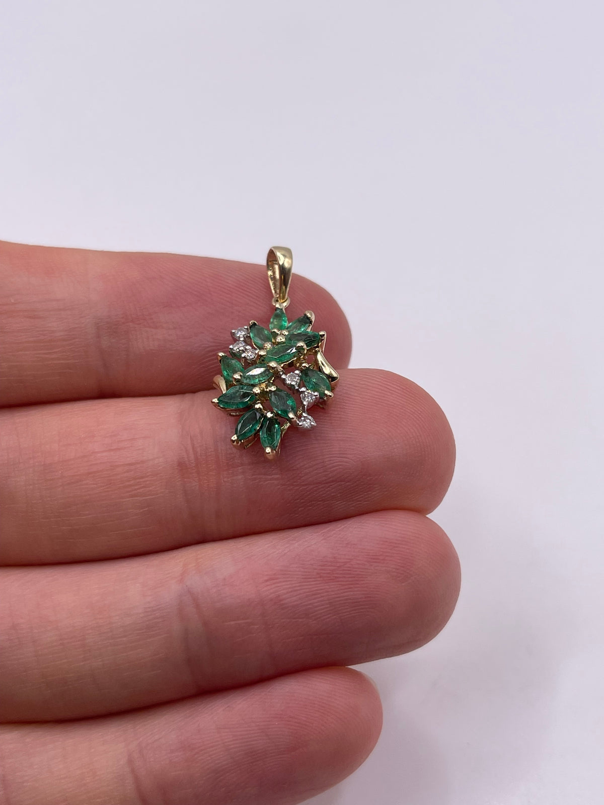 9ct gold emerald and diamond pendant