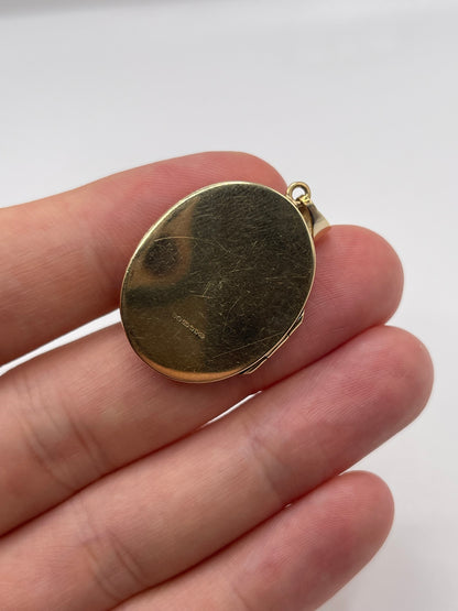 Heavy 9ct gold enamelled locket pendant