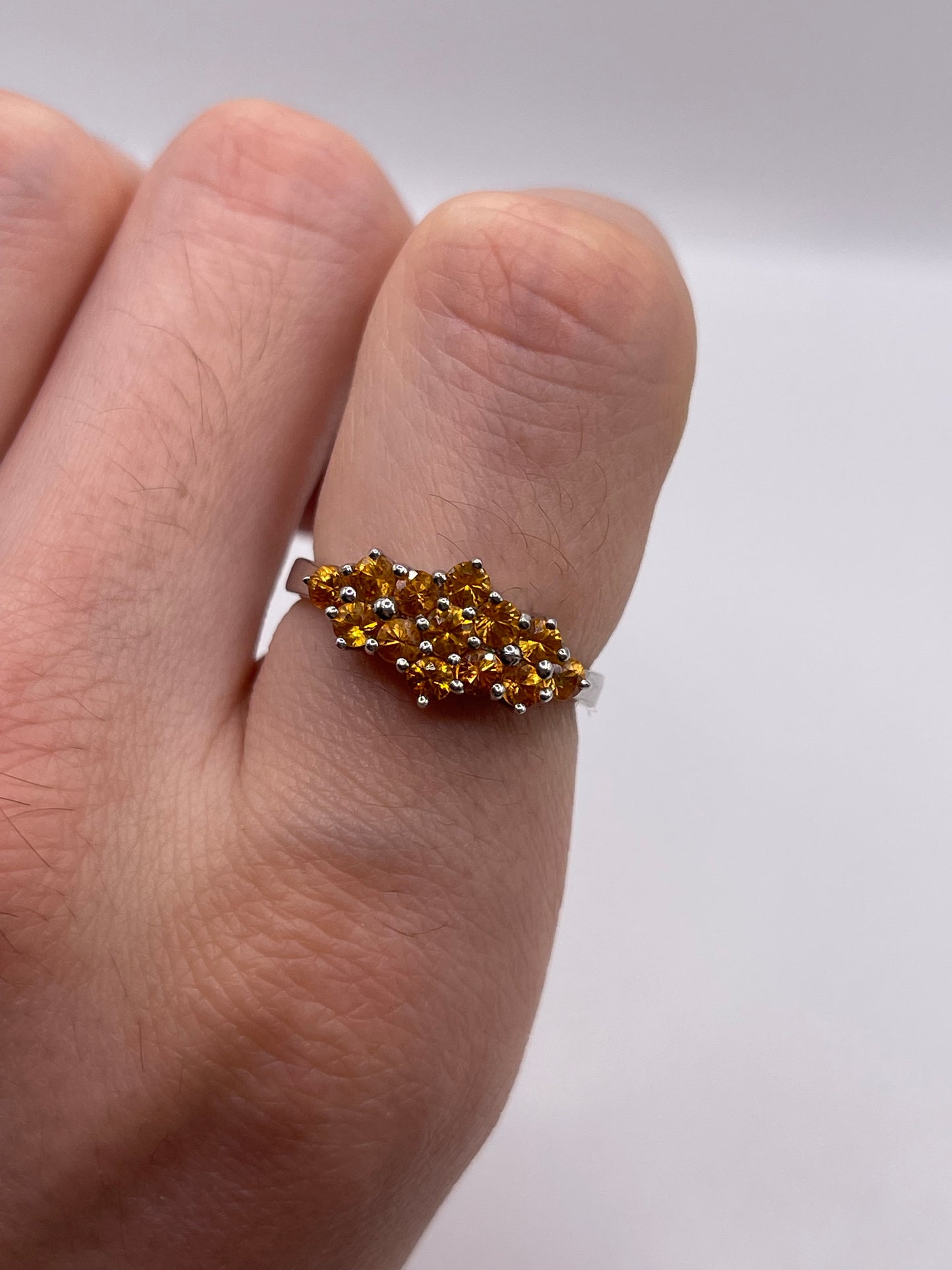 Silver orange sapphire ring
