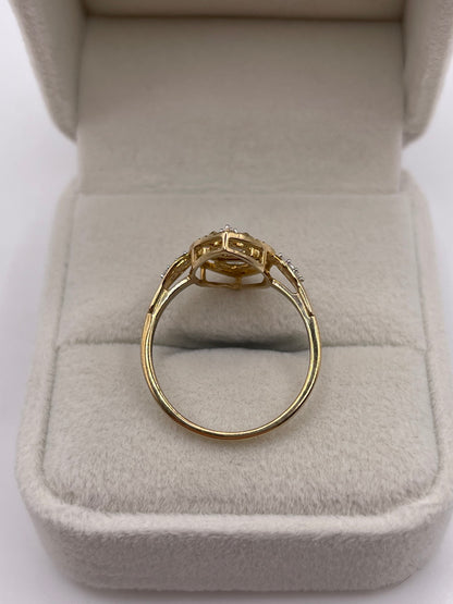 9ct gold topaz and zircon ring