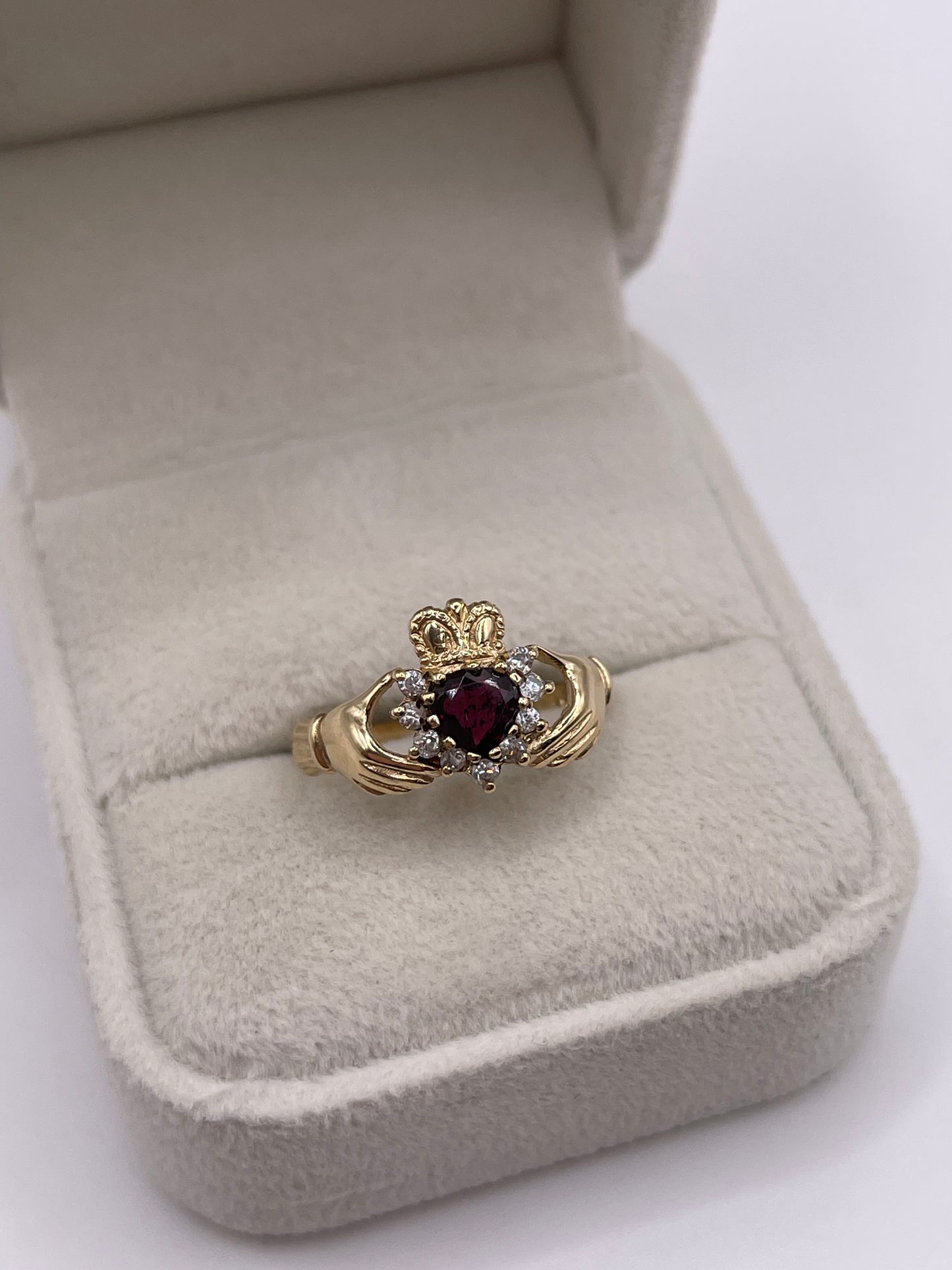 9ct gold garnet and cz claddagh ring