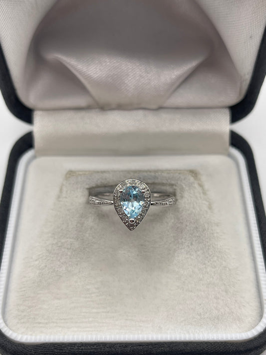 9ct white gold topaz and diamond ring