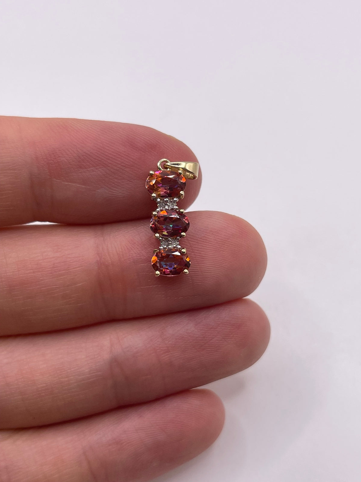 9ct gold topaz and diamond pendant