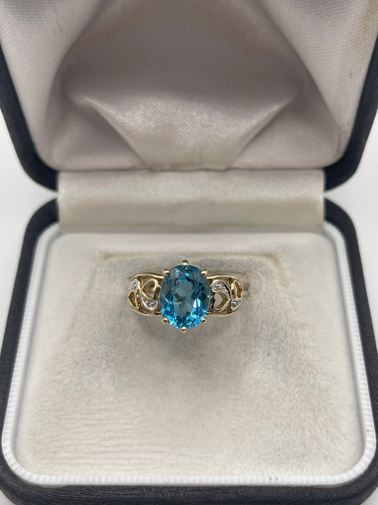9ct gold blue topaz and diamond ring
