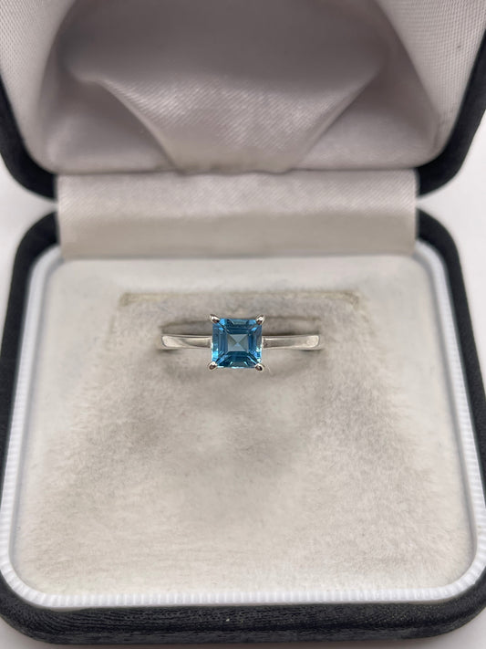 Silver topaz ring