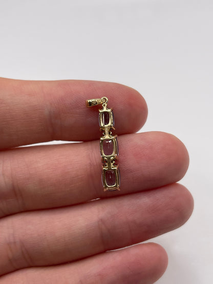 9ct gold iolite and diamond pendant