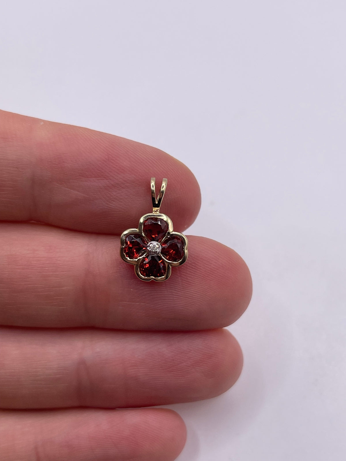 9ct gold garnet and diamond clover pendant