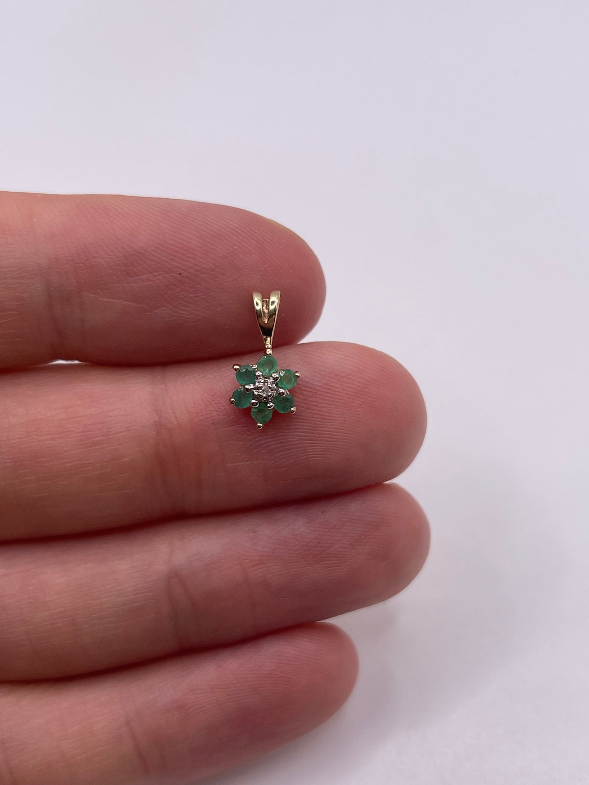 9ct gold emerald and diamond pendant
