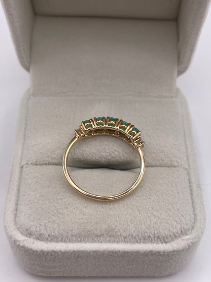 9ct gold emerald and zircon ring
