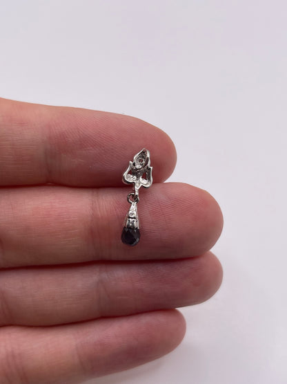 9ct white gold topaz and diamond pendant