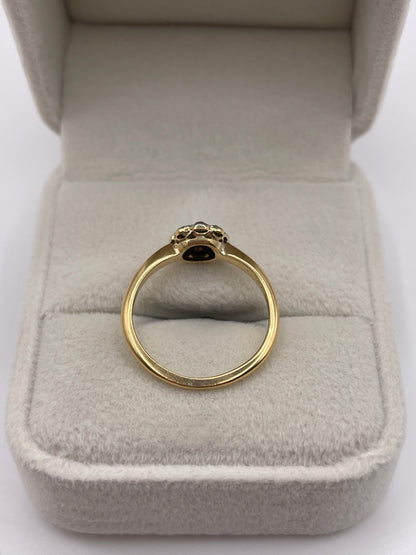 18ct gold emerald and diamond ring