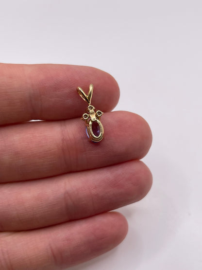 9ct gold tanzanite and diamond pendant