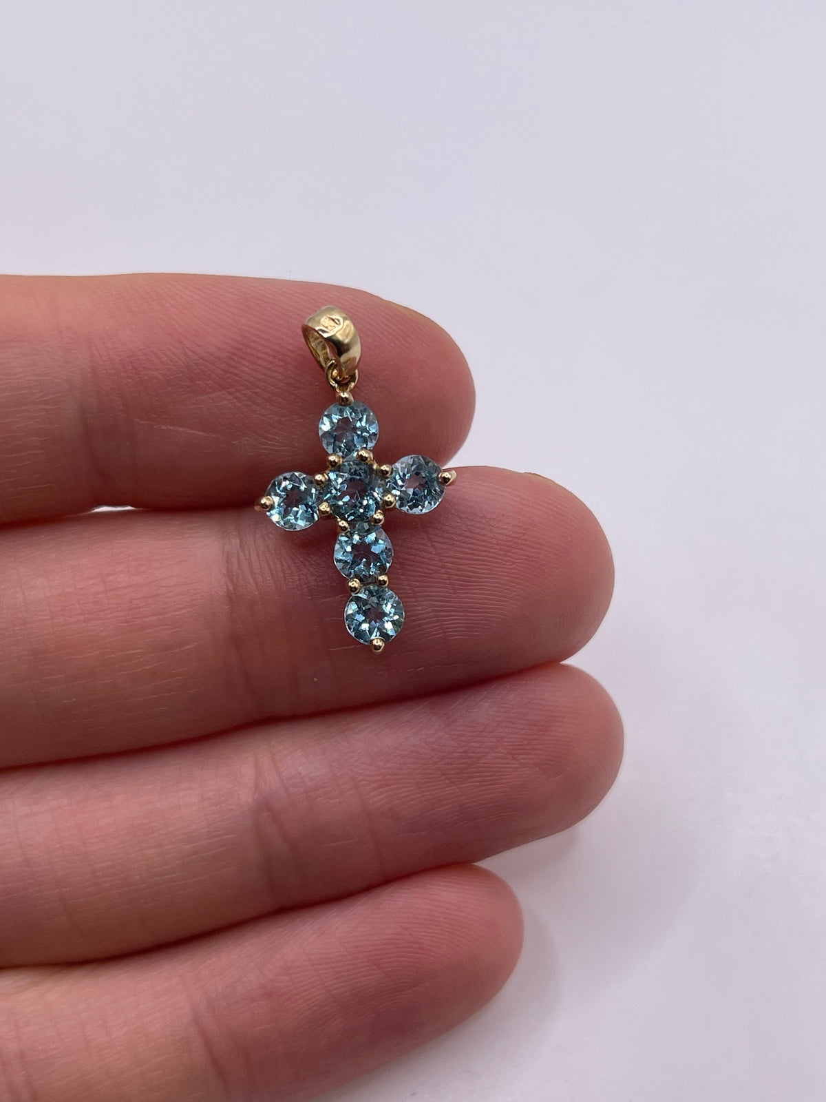 9ct gold blue topaz cross pendant