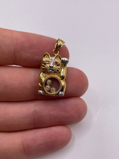 18ct gold ruby and diamond cat pendant