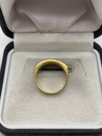 18ct gold emerald and cz ring
