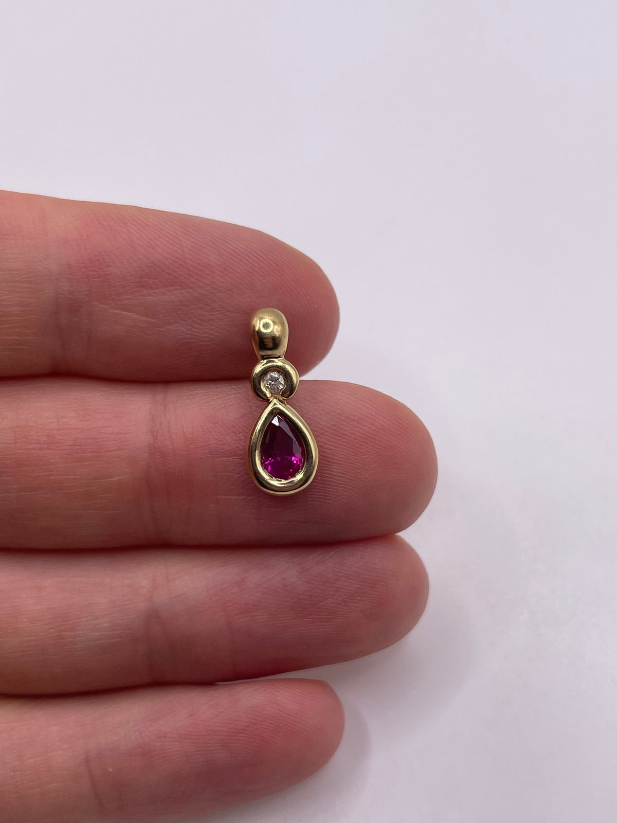 9ct gold ruby and diamond pendant