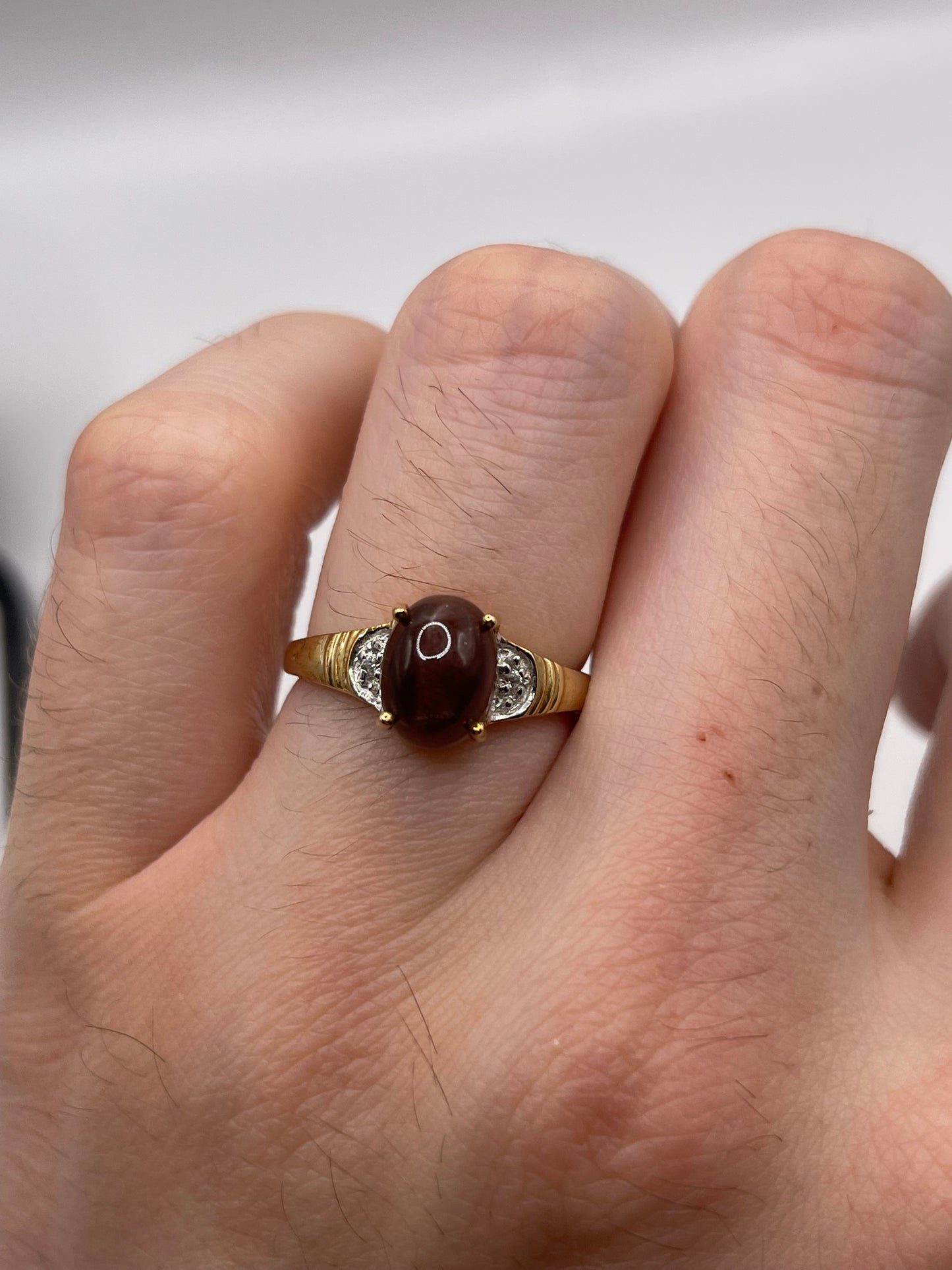 9ct gold cats eye and zircon ring
