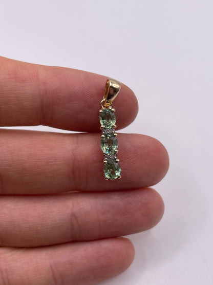 9ct gold green sapphire and diamond pendant