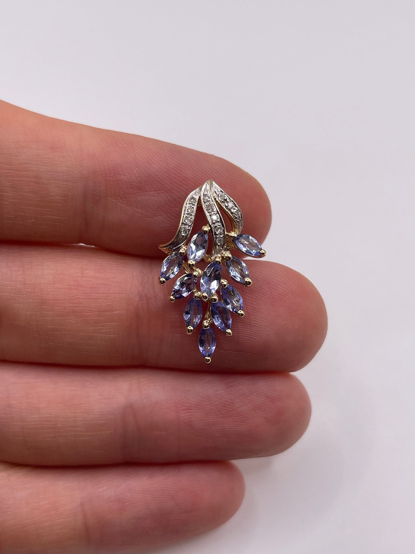 9ct gold tanzanite and diamond pendant