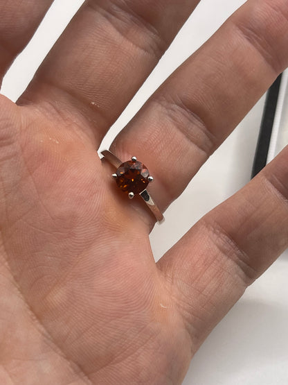 Silver topaz ring