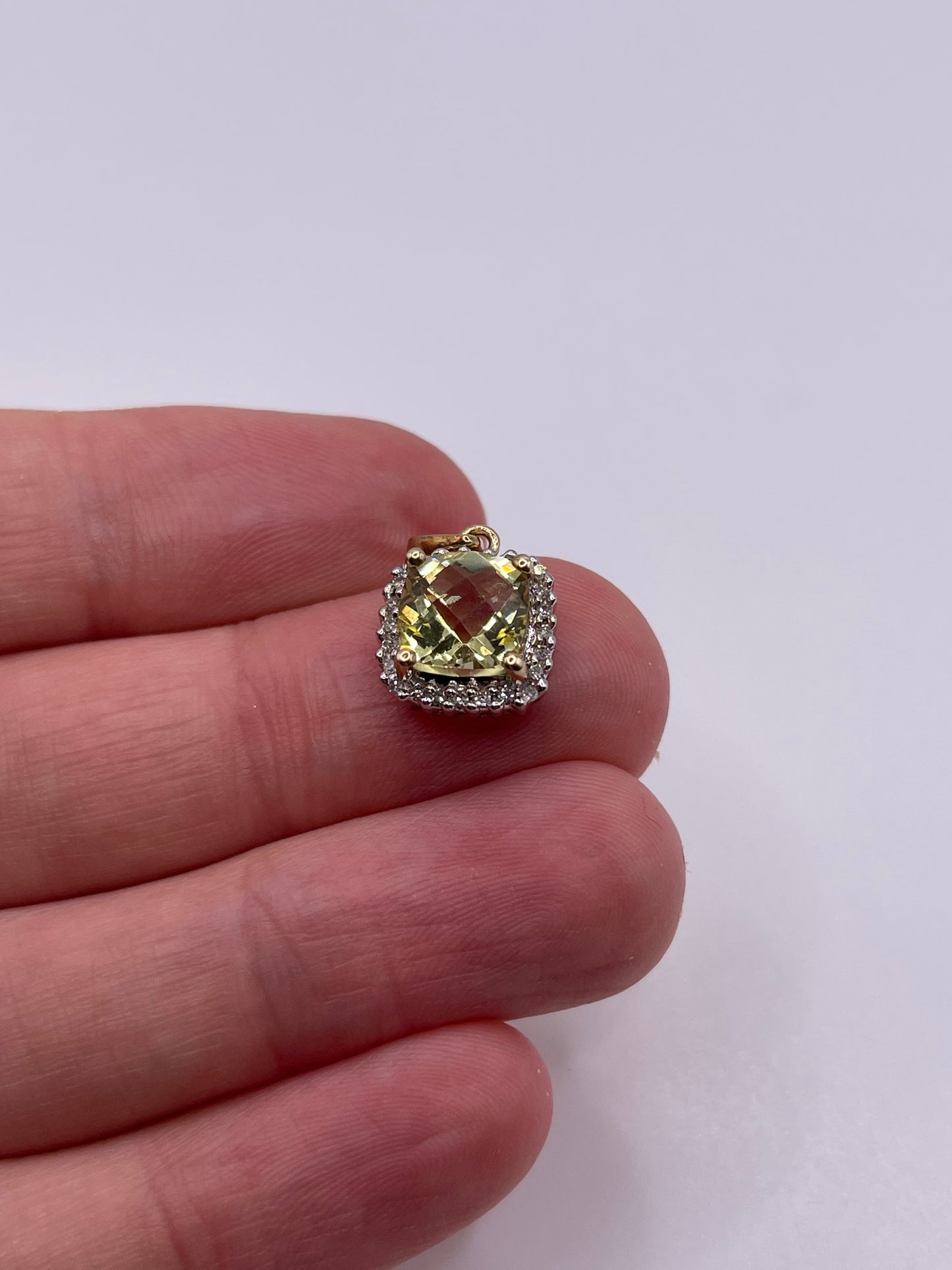 9ct gold quartz and diamond oendant