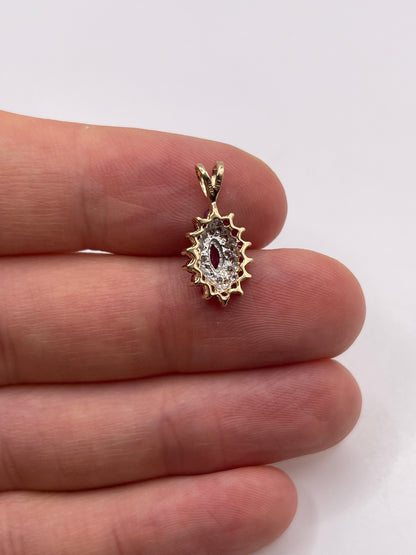 9ct gold ruby and diamond pendant