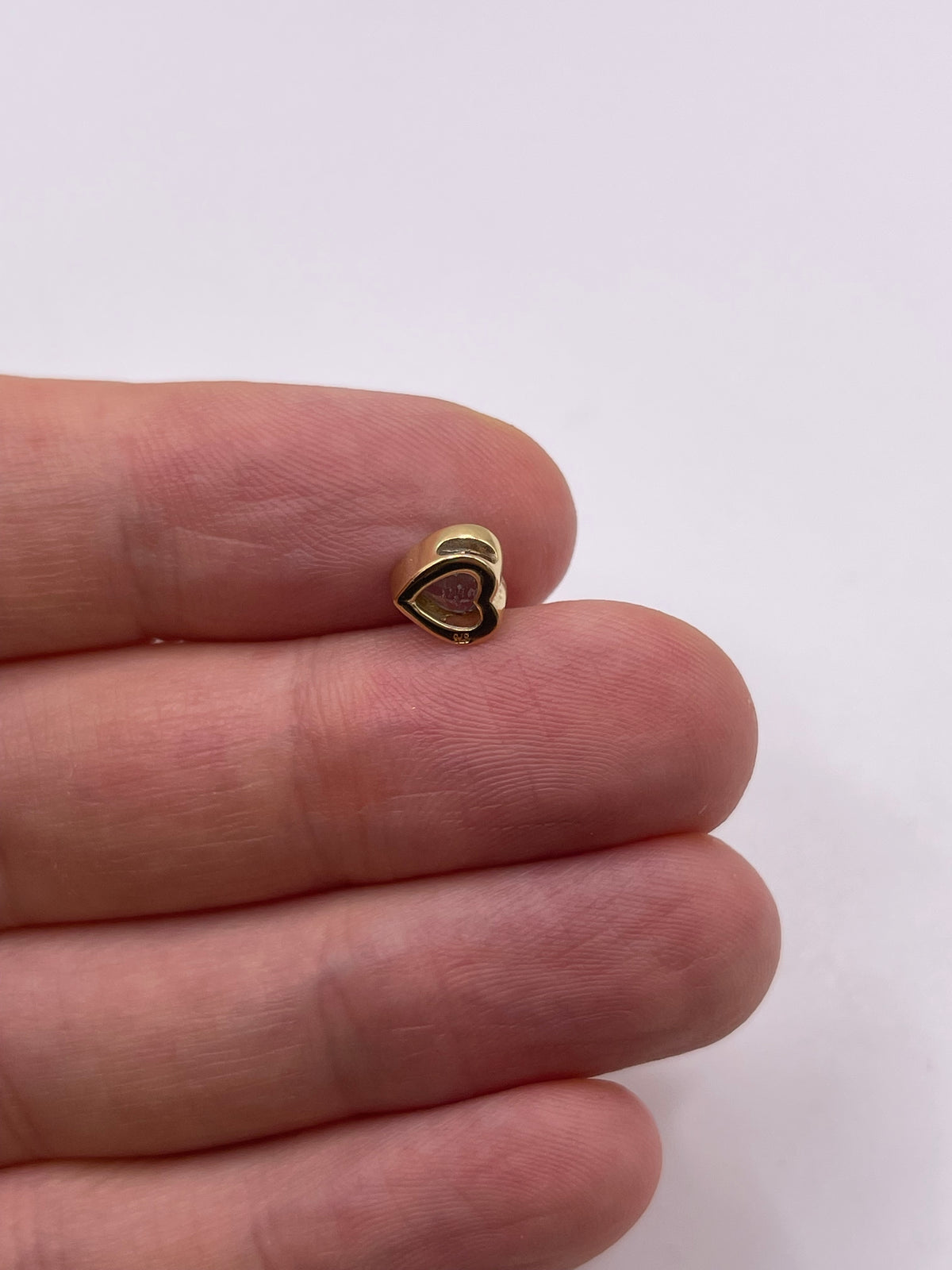 9ct gold blue topaz heart pendant