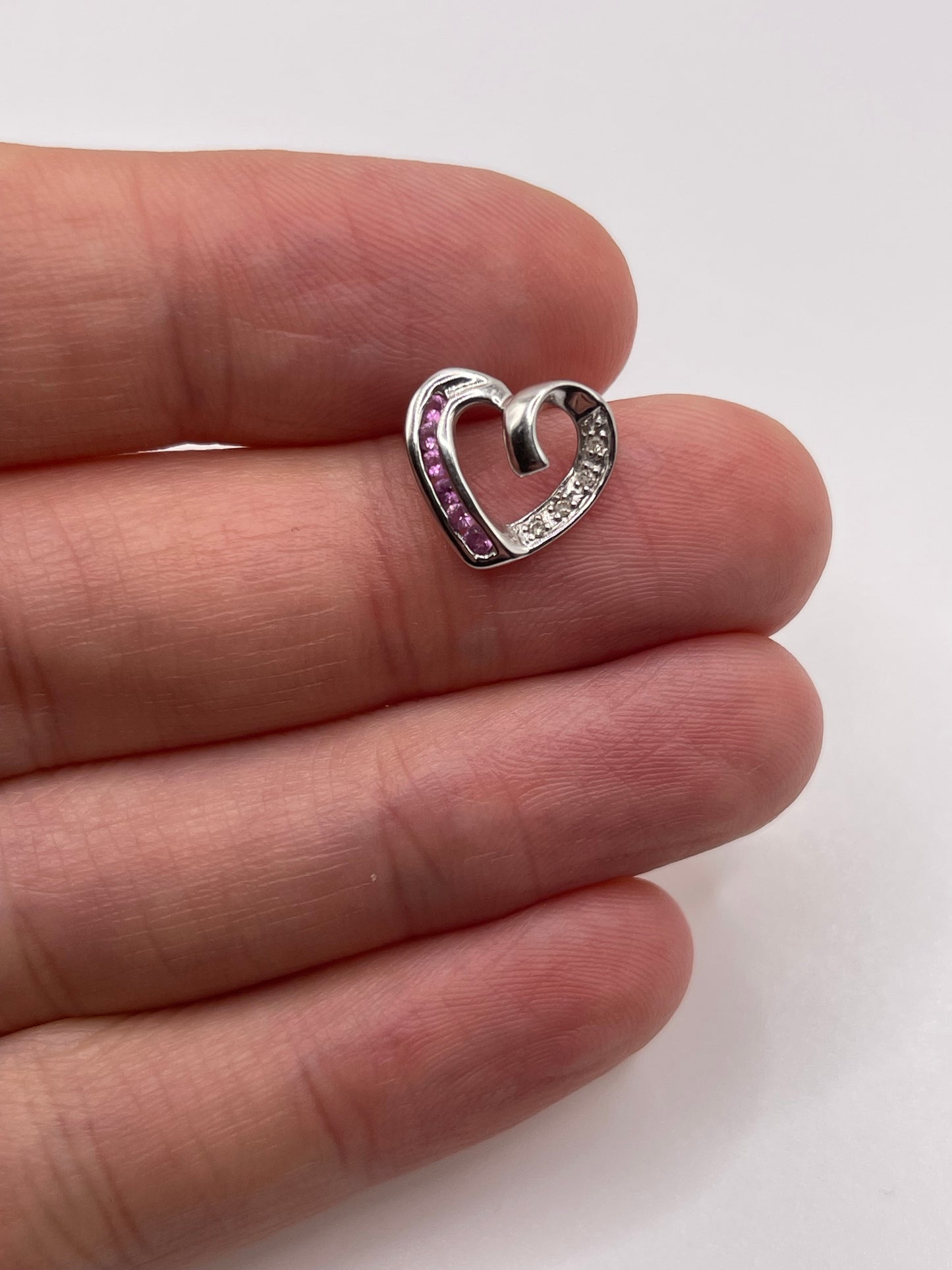 9ct white gold pink sapphire  and diamond pendant
