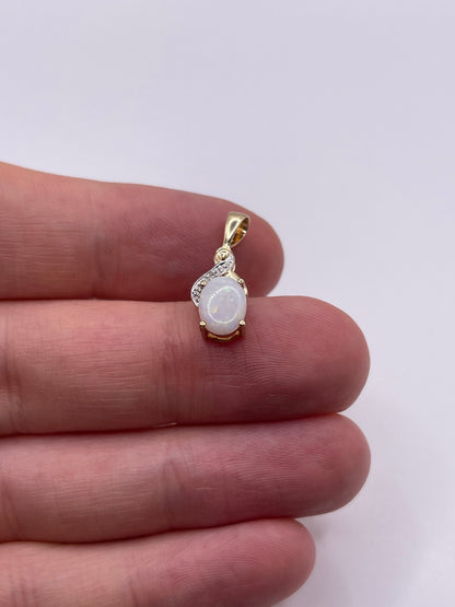 9ct gold opal and diamond pendant
