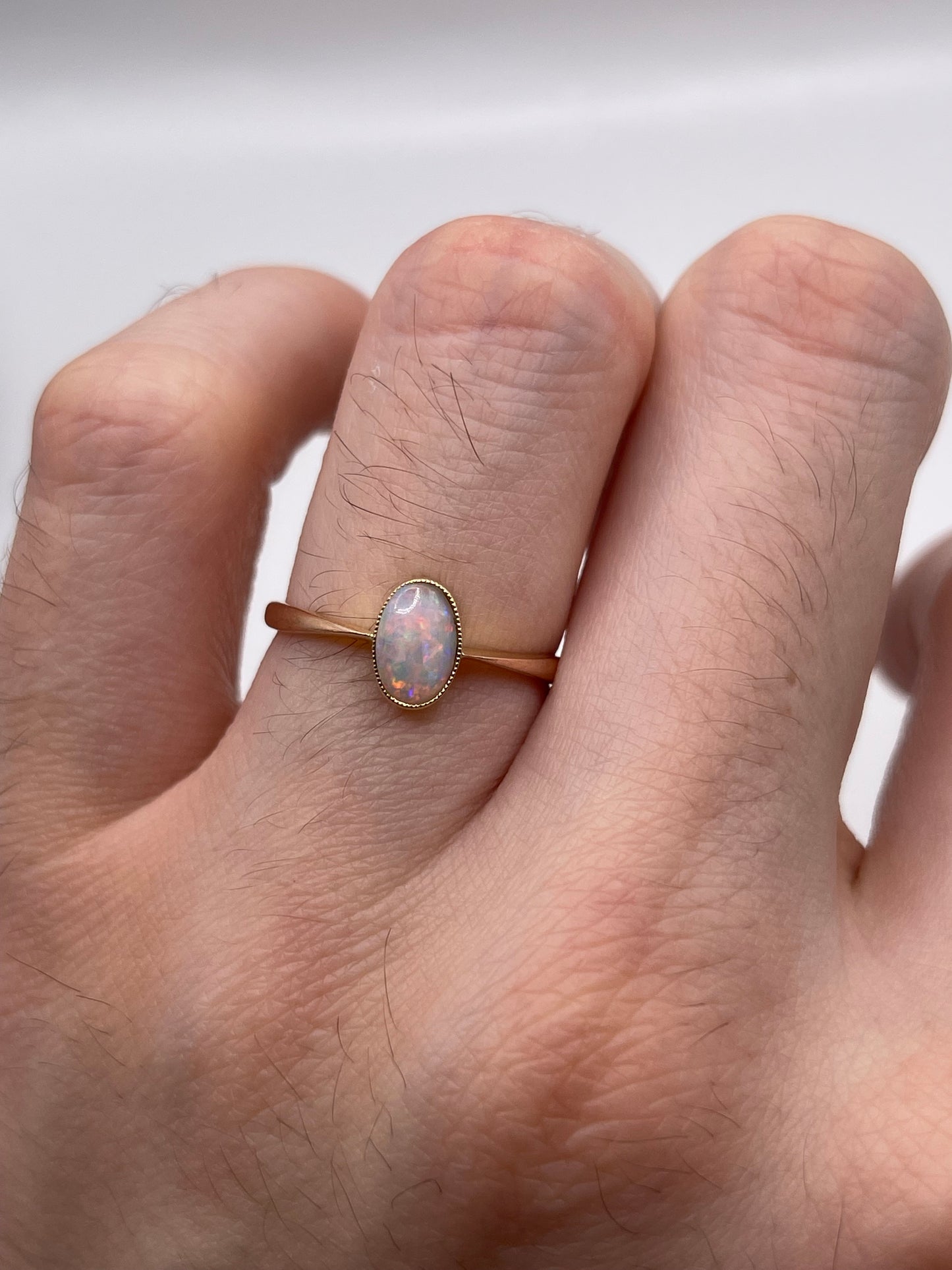 Antique 9ct rose gold opal ring