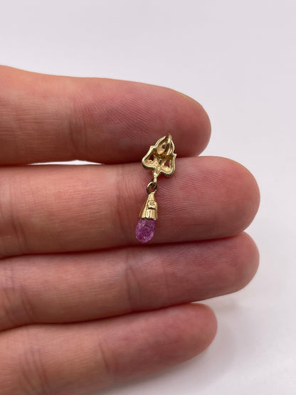 9ct gold pink sapphire and diamond pendant