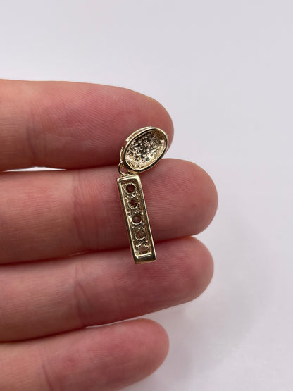 9ct gold tsavorite garnet and diamond pendant