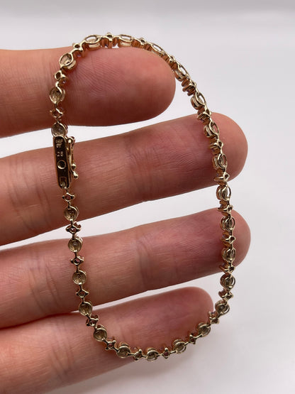 9ct gold pink sapphire and diamond bracelet
