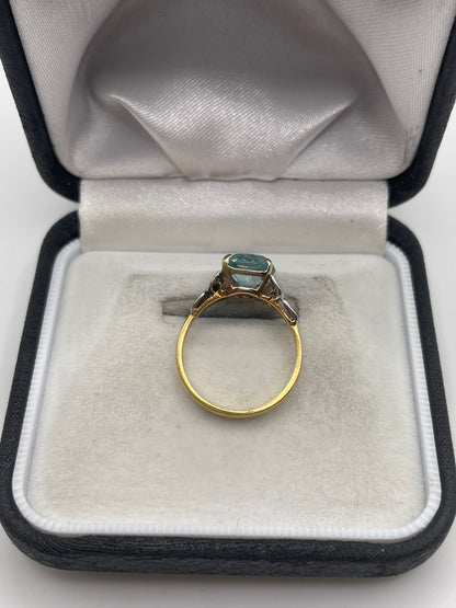 18ct gold blue zircon and diamond ring