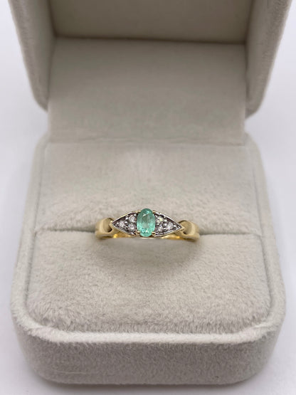 18ct gold emerald and diamond ring