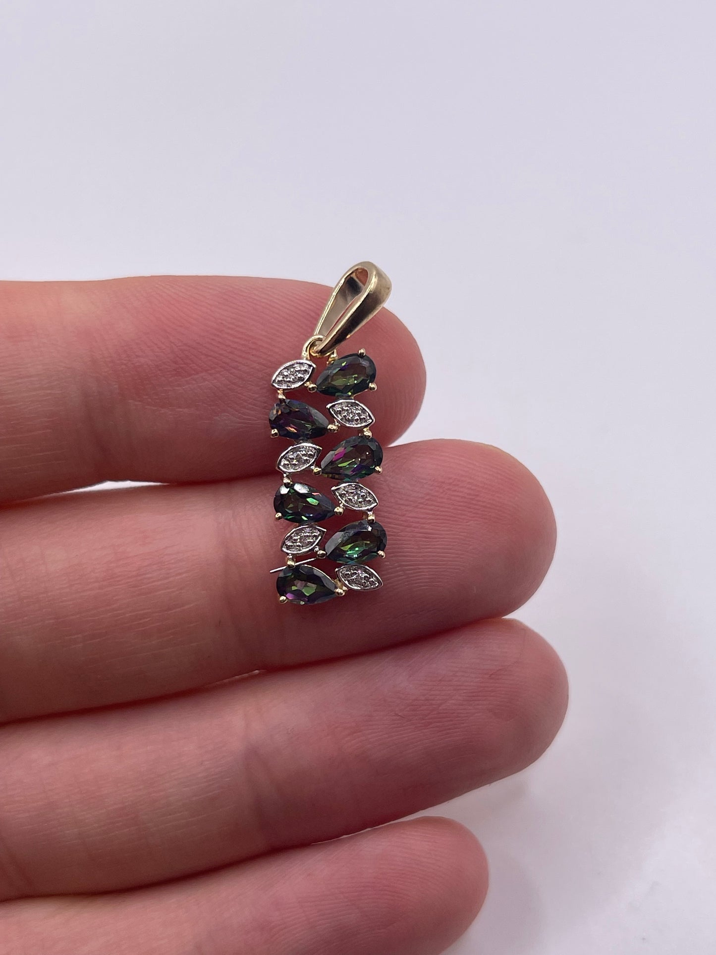 9ct gold mystic topaz and diamond pendant