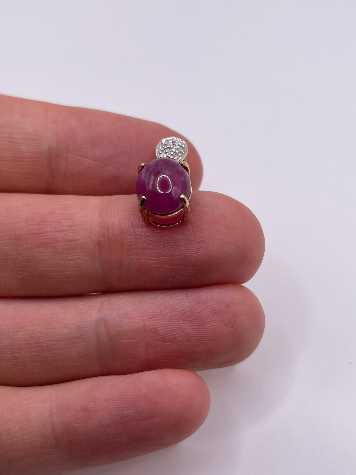 9ct gold cabochon ruby and diamond pendant