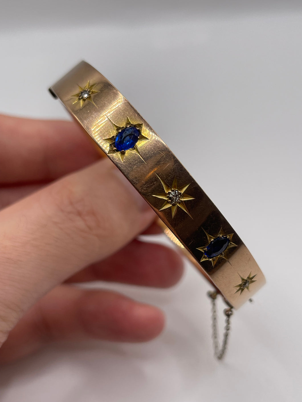 Antique 9ct rose gold synthetic sapphire and diamond bangle