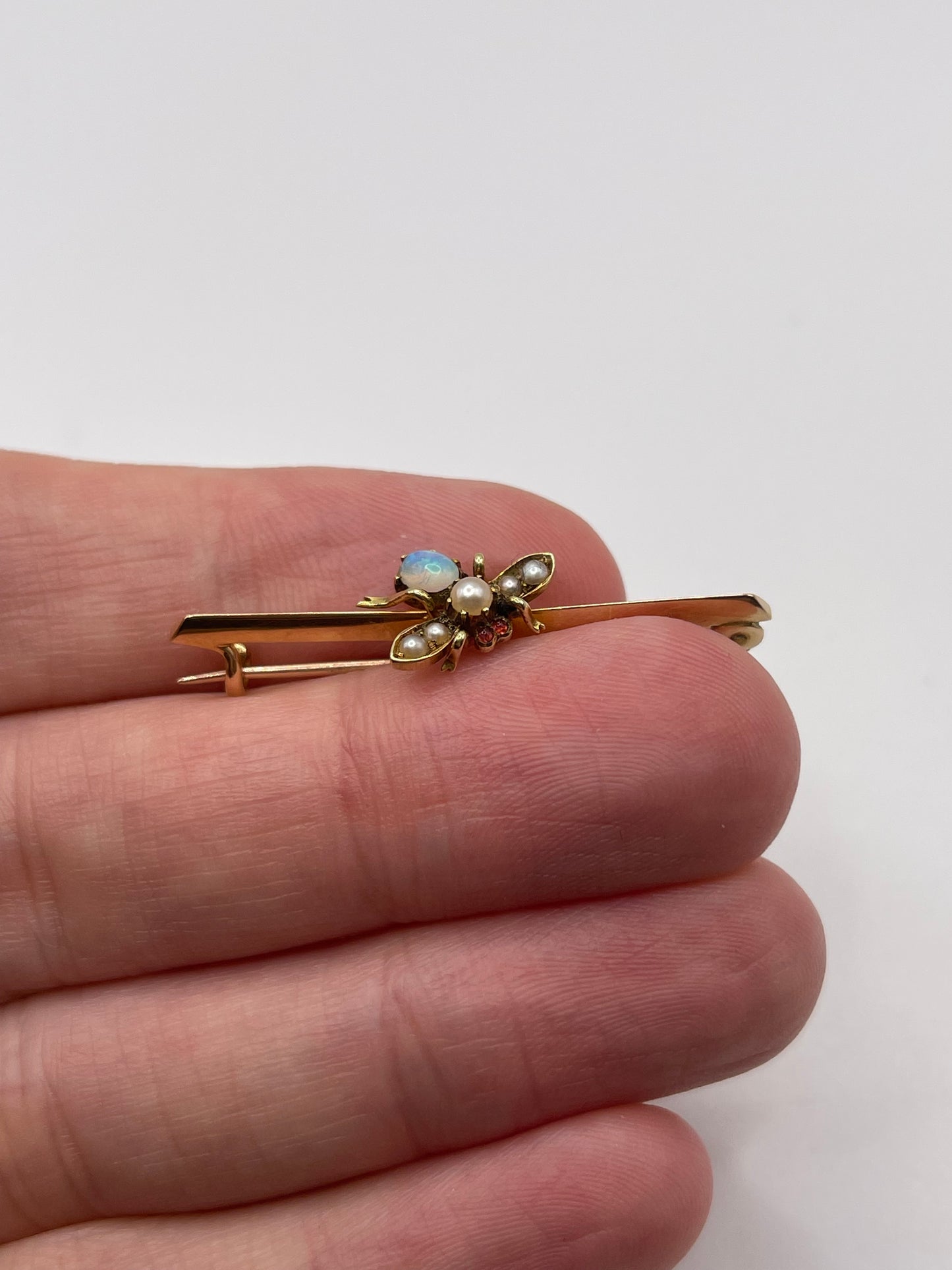 Antique 15ct gold opal, ruby and pearl insect brooch