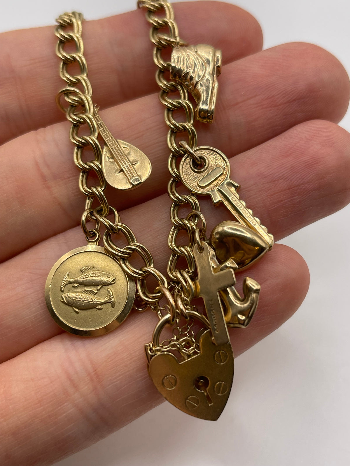 9ct gold charm bracelet