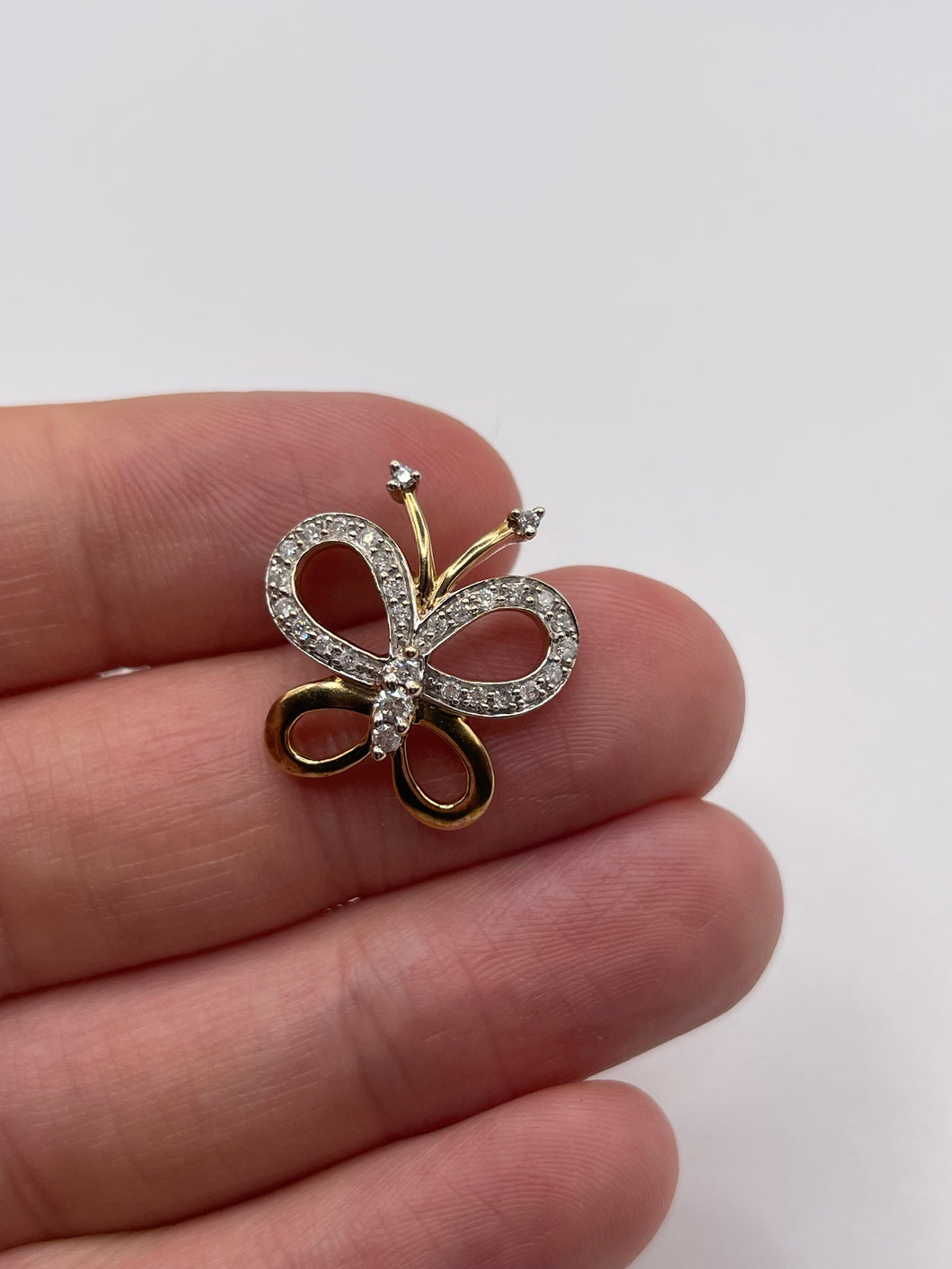 9ft gold diamond butterfly pendant