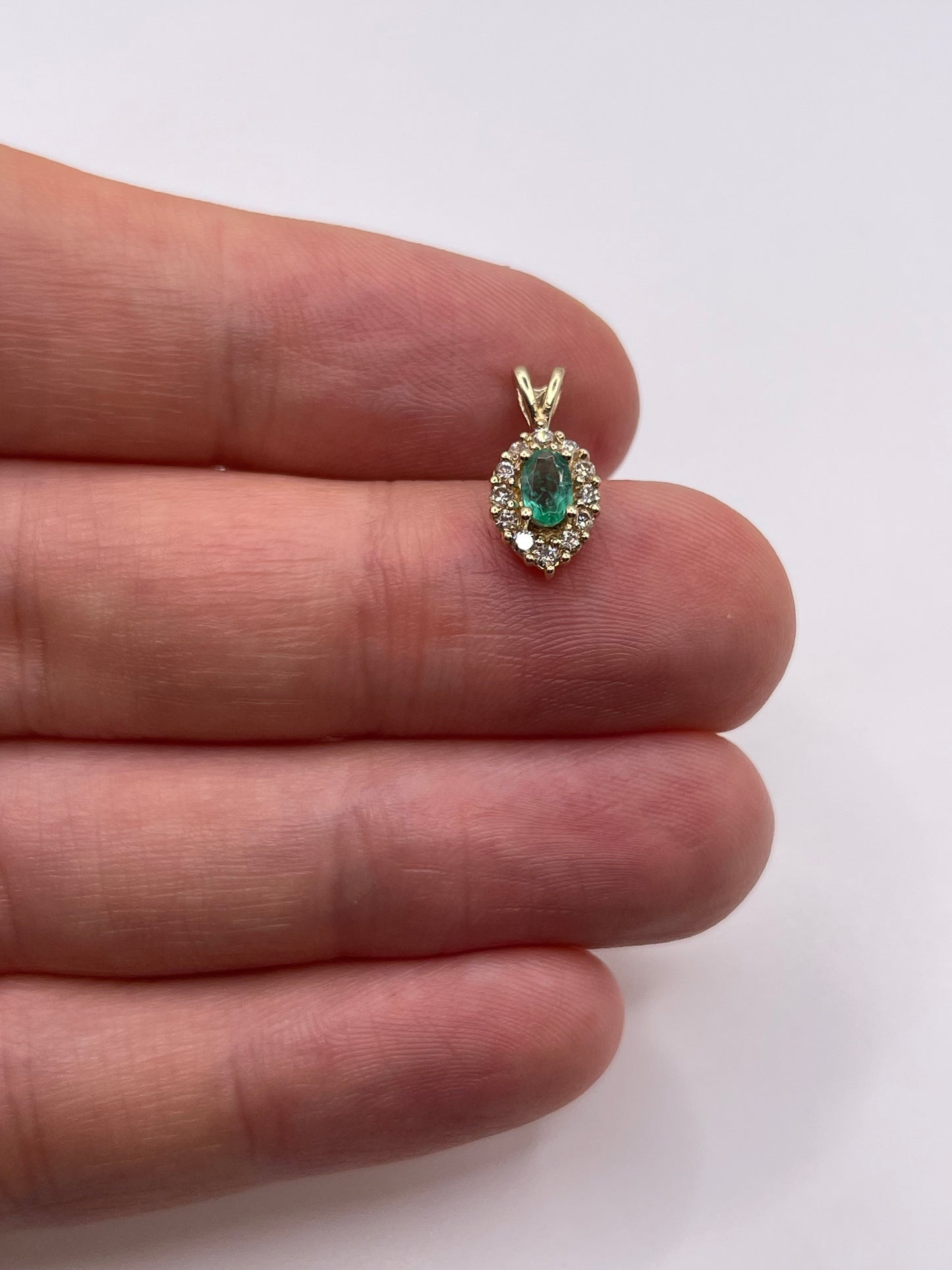 9ct gold emerald and diamond pendant