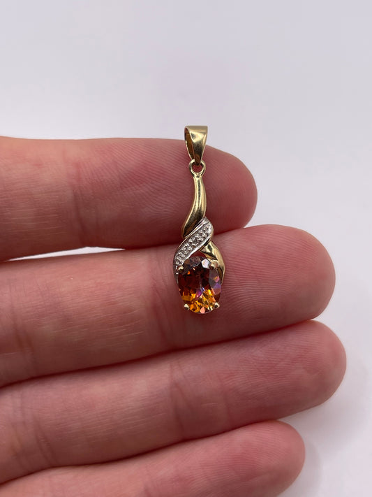 9ct gold topaz and diamond pendant