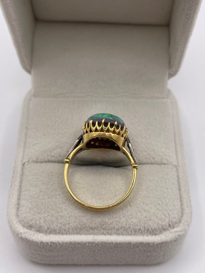 18ct gold solid black opal and diamond ring