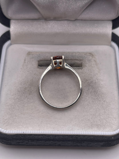 Silver topaz ring