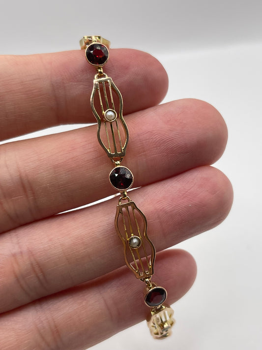Antique 9ct rose gold garnet and pearl bracelet