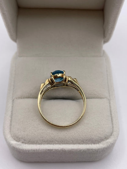 9ct gold blue topaz and diamond ring
